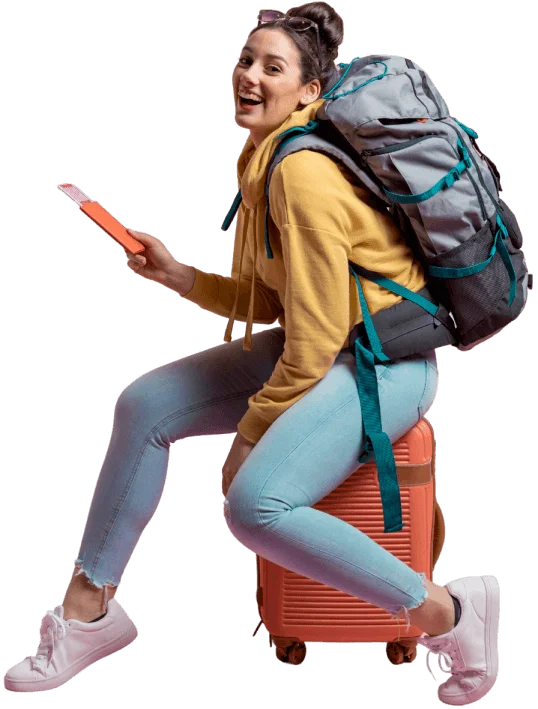 Young female traveler sitting on suitcase with ticket and backpack, planned by the best travel agency in Delhi.